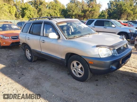 2004 Hyundai Santa Fe GLS z VIN KM8SC73E34U704154, wystawiony jako IAAI lot #43380665 z przebiegiem 68 777 mil mil oraz . Historia ofert i sprzedaży dostępna na DreamBid. Obrazek 1.