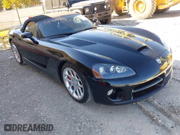 2005 Dodge Viper SRT-10 z VIN 1B3JZ65Z85V500374, wystawiony jako IAAI lot #43543522 z przebiegiem 41 503 mil mil oraz . Historia ofert i sprzedaży dostępna na DreamBid. Obrazek 1.