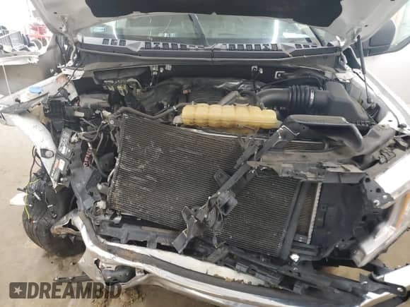 2018 Ford F-150 XL with VIN 1FTFW1E55JKF07288, listed as a Copart auction lot 58604595 with 125,695 mi miles and Salvage title. Bid and sale history available at DreamBid. Image 11.