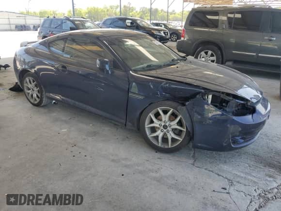 2008 Hyundai Tiburon GT с VIN KMHHN66FX8U280481, выставлен на аукционе Copart как лот 52960165 с пробегом 133 063 миль миль и На запчасти • Non repairable. История ставок и продаж доступна на DreamBid. Изображение 4.