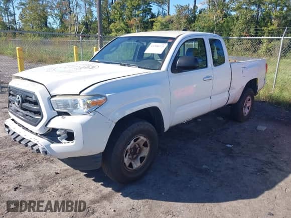 2016 Toyota Tacoma SR with VIN 5TFRX5GN4GX058969, listed as a IAAI auction lot 43590771 with 237,437 mi miles and . Bid and sale history available at DreamBid. Image 17.
