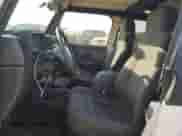 2004 Jeep Wrangler Sport z VIN 1J4FA49S14P725603, wystawiony jako Copart lot #81087705 z przebiegiem 212 553 mil mil oraz Czysty tytuł • Clean title. Historia ofert i sprzedaży dostępna na DreamBid. Obrazek 7.