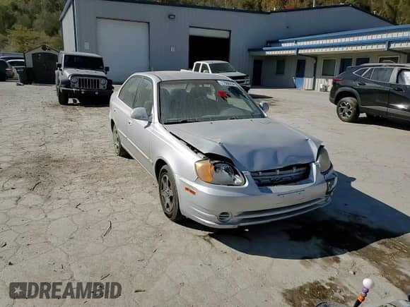 2005 Hyundai Accent GLS с VIN KMHCG45C75U638812, выставлен на аукционе Copart как лот 77968234 с пробегом 130 815 миль миль и Списание • Salvage title. История ставок и продаж доступна на DreamBid. Изображение 11.