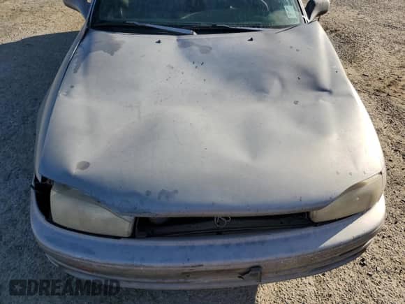 1992 Toyota Camry LE с VIN 4T1SK12E3NU104088, выставлен на аукционе Copart как лот 47496735 с пробегом 174 957 миль миль и Списание • Salvage title. История ставок и продаж доступна на DreamBid. Изображение 13.