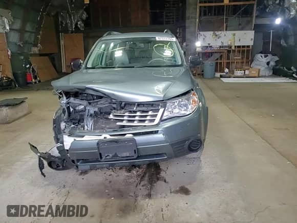 2011 Subaru Forester X with VIN JF2SHABC3BH776062, listed as a Copart auction lot 87313785 with 174,593 mi miles and Salvage title. Bid and sale history available at DreamBid. Image 14.