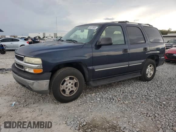 2004 Chevrolet Tahoe LT with VIN 1GNEC13Z04R122976, listed as a Copart auction lot 83970965 with 214,430 mi miles and Salvage title. Bid and sale history available at DreamBid. Image 1.