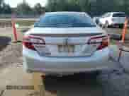 2014 Toyota Camry LE with VIN 4T1BF1FK0EU770393, listed as a Copart auction lot 83799895 with 231,676 mi miles and Salvage title. Bid and sale history available at DreamBid. Image 6.