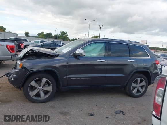 2016 Jeep Grand Cherokee Limited z VIN 1C4RJEBGXGC329874, wystawiony jako IAAI lot #43295520 z przebiegiem 135 086 mil mil oraz . Historia ofert i sprzedaży dostępna na DreamBid. Obrazek 14.