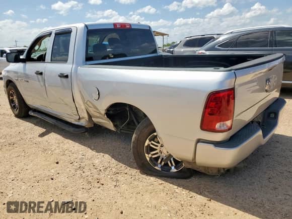 2009 Dodge 1500 ST with VIN 1D3HB18K79S745975, listed as a Copart auction lot 61354855 with 130,604 mi miles and Salvage title. Bid and sale history available at DreamBid. Image 2.