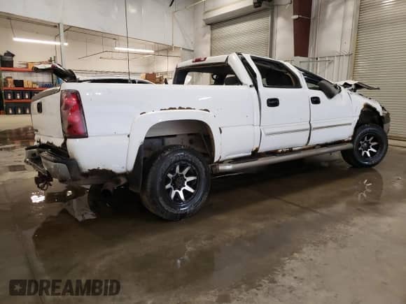 2003 Chevrolet Silverado 2500HD LS с VIN 1GCHK231X3F160630, выставлен на аукционе Copart как лот 55341204 с пробегом 306 372 миль миль и Списание • Salvage title. История ставок и продаж доступна на DreamBid. Изображение 3.