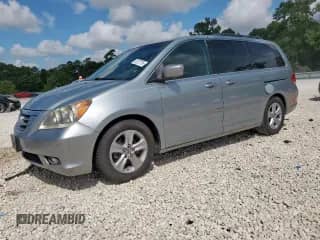 2009 Honda Odyssey Touring с VIN 5FNRL38969B034171, выставлен на аукционе Copart как лот 70927715 с пробегом 229 636 миль миль и Списание • Salvage title. История ставок и продаж доступна на DreamBid. Изображение 1.