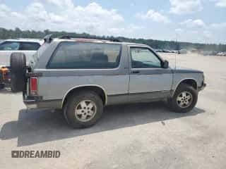 1991 Chevrolet Blazer z VIN 1GNCT18ZXM8187209, wystawiony jako Copart lot #65434985 z przebiegiem 128 662 mil mil oraz Szkoda całkowita • Salvage title. Historia ofert i sprzedaży dostępna na DreamBid. Obrazek 3.