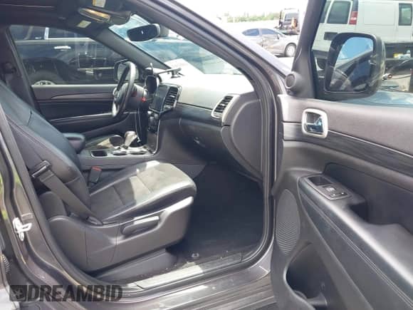 2020 Jeep Grand Cherokee Altitude with VIN 1C4RJEAG2LC428846, listed as a IAAI auction lot 43051607 with 66,769 mi miles and . Bid and sale history available at DreamBid. Image 5.