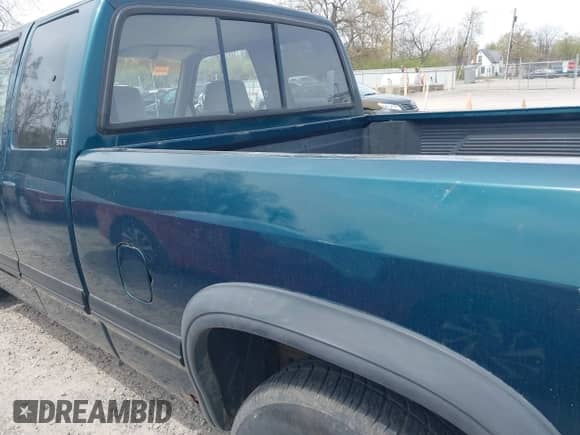 1996 Dodge Dakota with VIN 1B7GL23X2TS583075, listed as a IAAI auction lot 42049233 with 144,020 mi miles and . Bid and sale history available at DreamBid. Image 6.