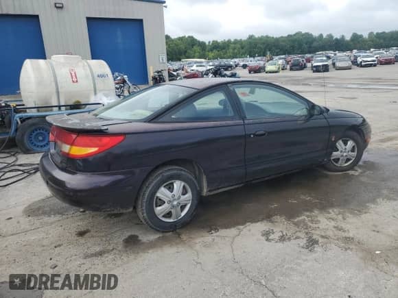 2000 Saturn SC с VIN 1G8ZP128XYZ176888, выставлен на аукционе Copart как лот 64061245 с пробегом 234 516 миль миль и Списание • Salvage title. История ставок и продаж доступна на DreamBid. Изображение 3.