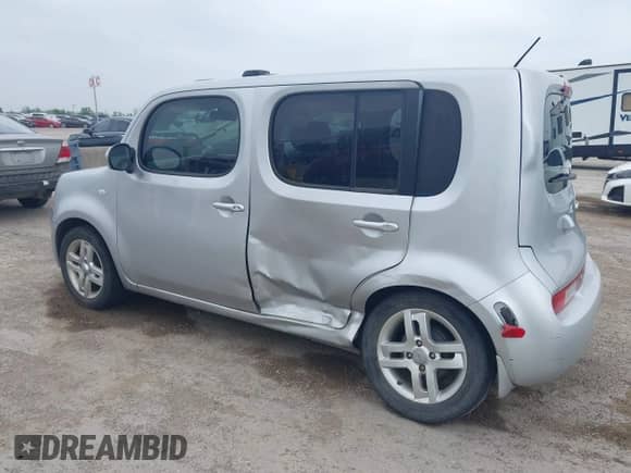 2013 Nissan Cube S with VIN JN8AZ2KR1DT304769, listed as a IAAI auction lot 41941411 with 64,518 mi miles and . Bid and sale history available at DreamBid. Image 6.