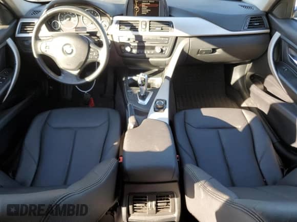 2014 BMW 3 Series 320i with VIN WBA3B1C56EP680339, listed as a Copart auction lot 82658825 with 76,283 mi miles and Salvage title. Bid and sale history available at DreamBid. Image 8.