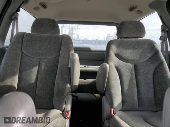 2000 Dodge Caravan SE z VIN 1B4GP44R6YB802320, wystawiony jako Copart lot #79336244 z przebiegiem 163 919 mil mil oraz Czysty tytuł • Clean title. Historia ofert i sprzedaży dostępna na DreamBid. Obrazek 10.