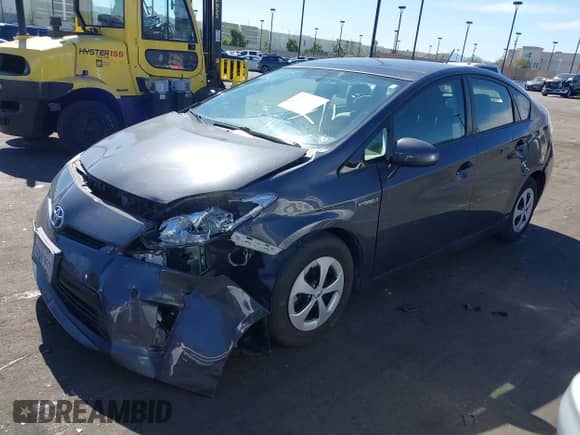 2015 Toyota Prius Four with VIN JTDKN3DU9F1890512, listed as a IAAI auction lot 41610350 with 86,396 mi miles and . Bid and sale history available at DreamBid. Image 2.