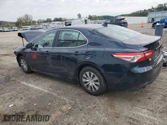 2019 Toyota Camry Hybrid LE с VIN 4T1B31HK1KU509422, выставлен на аукционе Copart как лот 86729355 с пробегом 63 027 миль миль и Списание • Salvage title. История ставок и продаж доступна на DreamBid. Изображение 2.