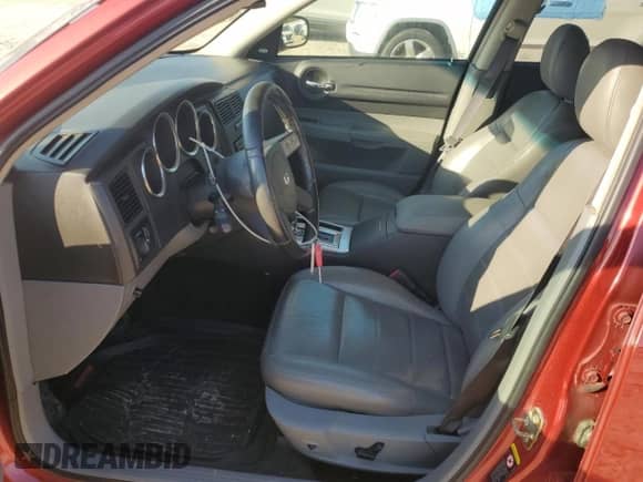 2005 Dodge Magnum RT с VIN 2D8GV58245H671047, выставлен на аукционе Copart как лот 77105524 с пробегом 178 885 миль миль и Списание • Salvage title. История ставок и продаж доступна на DreamBid. Изображение 7.