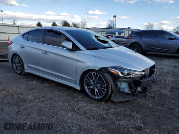 2018 Hyundai Elantra Sport с VIN KMHD04LB0JU702069, выставлен на аукционе Copart как лот 87080504 с пробегом 64 429 миль миль и Списание • Salvage title. История ставок и продаж доступна на DreamBid. Изображение 4.