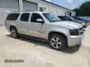 2008 Chevrolet Suburban LTZ with VIN 1GNFC16J38R129579, listed as a Copart auction lot 62200415 with 265,399 mi miles and Salvage title. Bid and sale history available at DreamBid. Image 4.