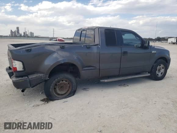 2006 Ford F-150 STX with VIN 1FTRX02W26KB22442, listed as a Copart auction lot 48959125 with 238,690 mi miles and Salvage title. Bid and sale history available at DreamBid. Image 3.