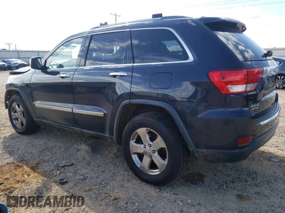 2013 Jeep Grand Cherokee Limited z VIN 1C4RJFBG6DC523884, wystawiony jako Copart lot #82273625 z przebiegiem Nie podano mil oraz Szkoda całkowita • Salvage title. Historia ofert i sprzedaży dostępna na DreamBid. Obrazek 2.