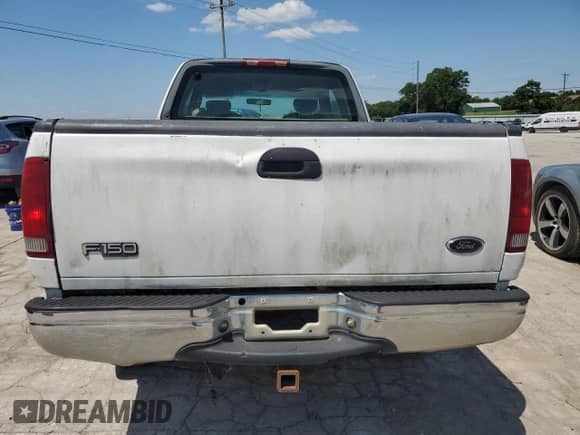 2002 Ford F-150 XL with VIN 2FTPX18L92CA44010, listed as a Copart auction lot 74502864 with Not provided miles and Salvage title. Bid and sale history available at DreamBid. Image 6.