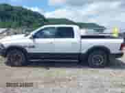 2015 Ram 1500 Rebel with VIN 1C6RR7YT0FS751169, listed as a IAAI auction lot 42689218 with 101,431 mi miles and . Bid and sale history available at DreamBid. Image 14.