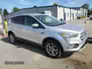 2017 Ford Escape SE с VIN 1FMCU9GD3HUC41579, выставлен на аукционе Copart как лот 84071535 с пробегом 142 241 миль миль и Чистый • Clean title. История ставок и продаж доступна на DreamBid. Изображение 4.