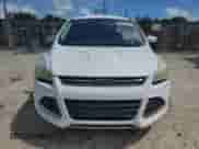 2014 Ford Escape SE z VIN 1FMCU0GX4EUD59626, wystawiony jako Copart lot #84579085 z przebiegiem 144 900 mil mil oraz Czysty tytuł • Clean title. Historia ofert i sprzedaży dostępna na DreamBid. Obrazek 5.