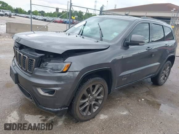 2016 Jeep Grand Cherokee Limited with VIN 1C4RJFBG4GC471840, listed as a IAAI auction lot 42564969 with 142,613 mi miles and . Bid and sale history available at DreamBid. Image 2.