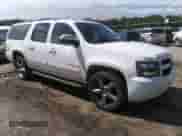 2014 Chevrolet Suburban LT z VIN 1GNSKJE75ER200316, wystawiony jako IAAI lot #42230953 z przebiegiem 167 786 mil mil oraz . Historia ofert i sprzedaży dostępna na DreamBid. Obrazek 1.