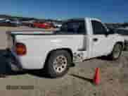 2002 GMC Sierra 1500 z VIN 1GTEC14W22Z331436, wystawiony jako Copart lot #84550994 z przebiegiem 243 764 mil mil oraz Szkoda całkowita • Salvage title. Historia ofert i sprzedaży dostępna na DreamBid. Obrazek 3.