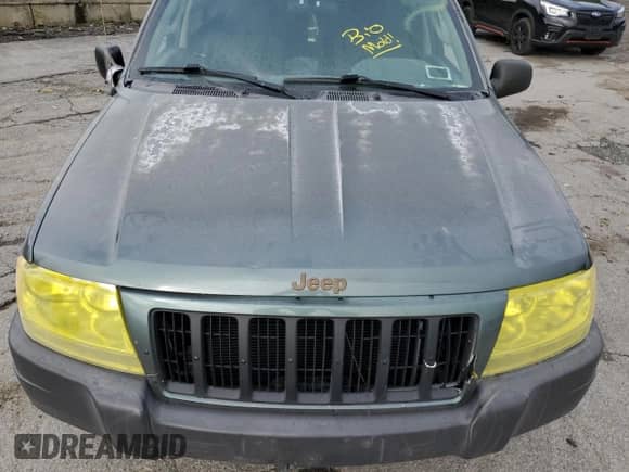 2004 Jeep Grand Cherokee Laredo z VIN 1J4GW48S74C226951, wystawiony jako Copart lot #67917385 z przebiegiem 231 849 mil mil oraz Szkoda całkowita • Salvage title. Historia ofert i sprzedaży dostępna na DreamBid. Obrazek 12.