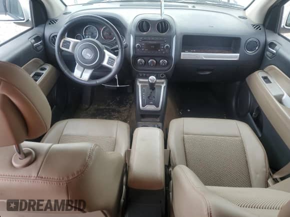 2017 Jeep Compass Latitude with VIN 1C4NJCEA7HD115169, listed as a Copart auction lot 65231945 with 169,540 mi miles and Salvage title. Bid and sale history available at DreamBid. Image 8.