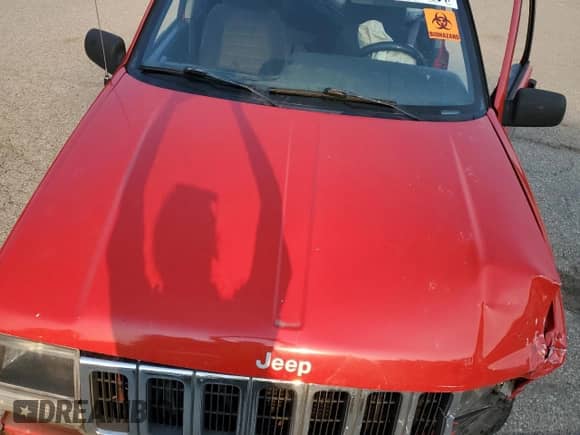 1996 Jeep Grand Cherokee с VIN 1J4EZ58Y5TC142263, выставлен на аукционе Copart как лот 70532894 с пробегом Не указан миль и Списание • Salvage title. История ставок и продаж доступна на DreamBid. Изображение 11.