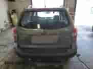 2015 Subaru Forester z VIN SA0123301, wystawiony jako Copart lot #54677574 z przebiegiem 58 430 mil mil oraz Szkoda całkowita • Salvage title. Historia ofert i sprzedaży dostępna na DreamBid. Obrazek 6.