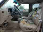1999 Chevrolet Suburban с VIN 3GNEC16R9XG186868, выставлен на аукционе Copart как лот 67145805 с пробегом 296 144 миль миль и Списание • Salvage title. История ставок и продаж доступна на DreamBid. Изображение 7.