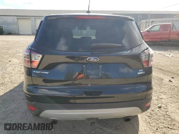 2017 Ford Escape SE z VIN 1FMCU9G90HUB78081, wystawiony jako Copart lot #86597605 z przebiegiem 157 266 mil mil oraz Czysty tytuł • Clean title. Historia ofert i sprzedaży dostępna na DreamBid. Obrazek 6.