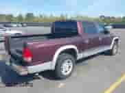 2004 Dodge Dakota SLT z VIN 1D7HL48N74S586018, wystawiony jako IAAI lot #41910755 z przebiegiem 259 924 mil mil oraz . Historia ofert i sprzedaży dostępna na DreamBid. Obrazek 4.