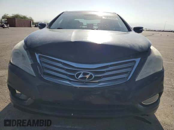 2013 Hyundai Azera с VIN KMHFH4JG1DA302205, выставлен на аукционе Copart как лот 70840334 с пробегом 194 210 миль миль и Списание • Salvage title. История ставок и продаж доступна на DreamBid. Изображение 5.