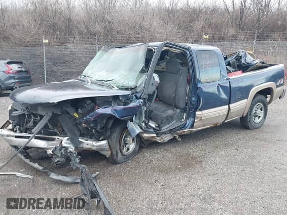 1999 Chevrolet Silverado 2500 LS z VIN 1GCGK29U4XE233127, wystawiony jako IAAI lot #41811564 z przebiegiem Nie podano mil oraz . Historia ofert i sprzedaży dostępna na DreamBid. Obrazek 2.