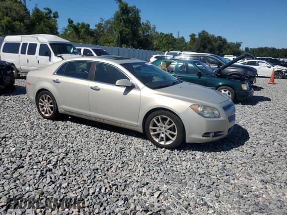 2012 Chevrolet Malibu LTZ 1LZ with VIN 1G1ZE5E02CF180672, listed as a Copart auction lot 86607385 with 134,309 mi miles and Salvage title. Bid and sale history available at DreamBid. Image 4.