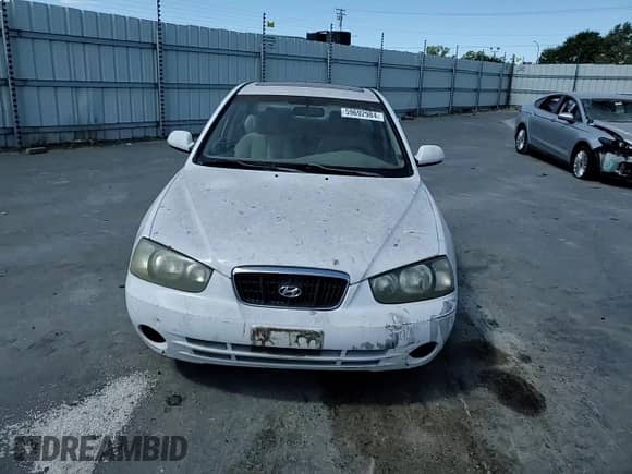2003 Hyundai Elantra GLS z VIN KMHDN45D63U595788, wystawiony jako Copart lot #59692984 z przebiegiem 119 573 mil mil oraz Szkoda całkowita • Salvage title. Historia ofert i sprzedaży dostępna na DreamBid. Obrazek 11.