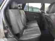 2012 Hyundai Santa Fe SE с VIN 5XYZHDAGXCG140591, выставлен на аукционе Copart как лот 81574875 с пробегом 168 780 миль миль и Списание • Salvage title. История ставок и продаж доступна на DreamBid. Изображение 11.