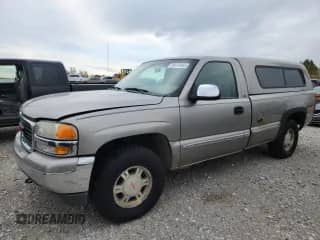 1999 GMC Sierra 1500 SLE with VIN 1GTEK14T4XE504638, listed as a Copart auction lot 89474065 with 203,713 mi miles and Clean title. Bid and sale history available at DreamBid. Image 1.
