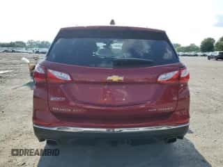2020 Chevrolet Equinox Premier с VIN 3GNAXYEX2LS610958, выставлен на аукционе Copart как лот 68550585 с пробегом 32 041 миль миль и Списание • Salvage title. История ставок и продаж доступна на DreamBid. Изображение 6.